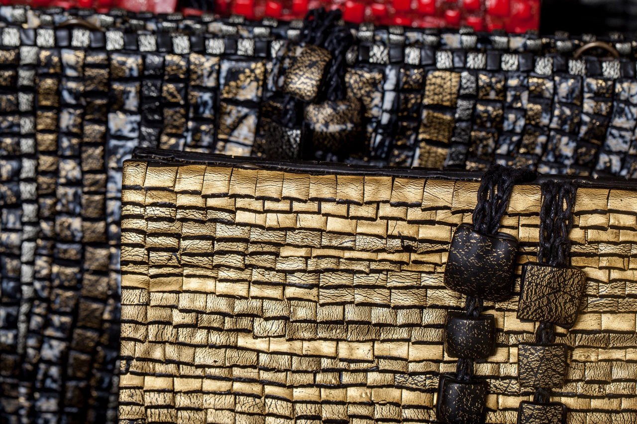 GFW clutches in gold, black, silver, red and checkerboard