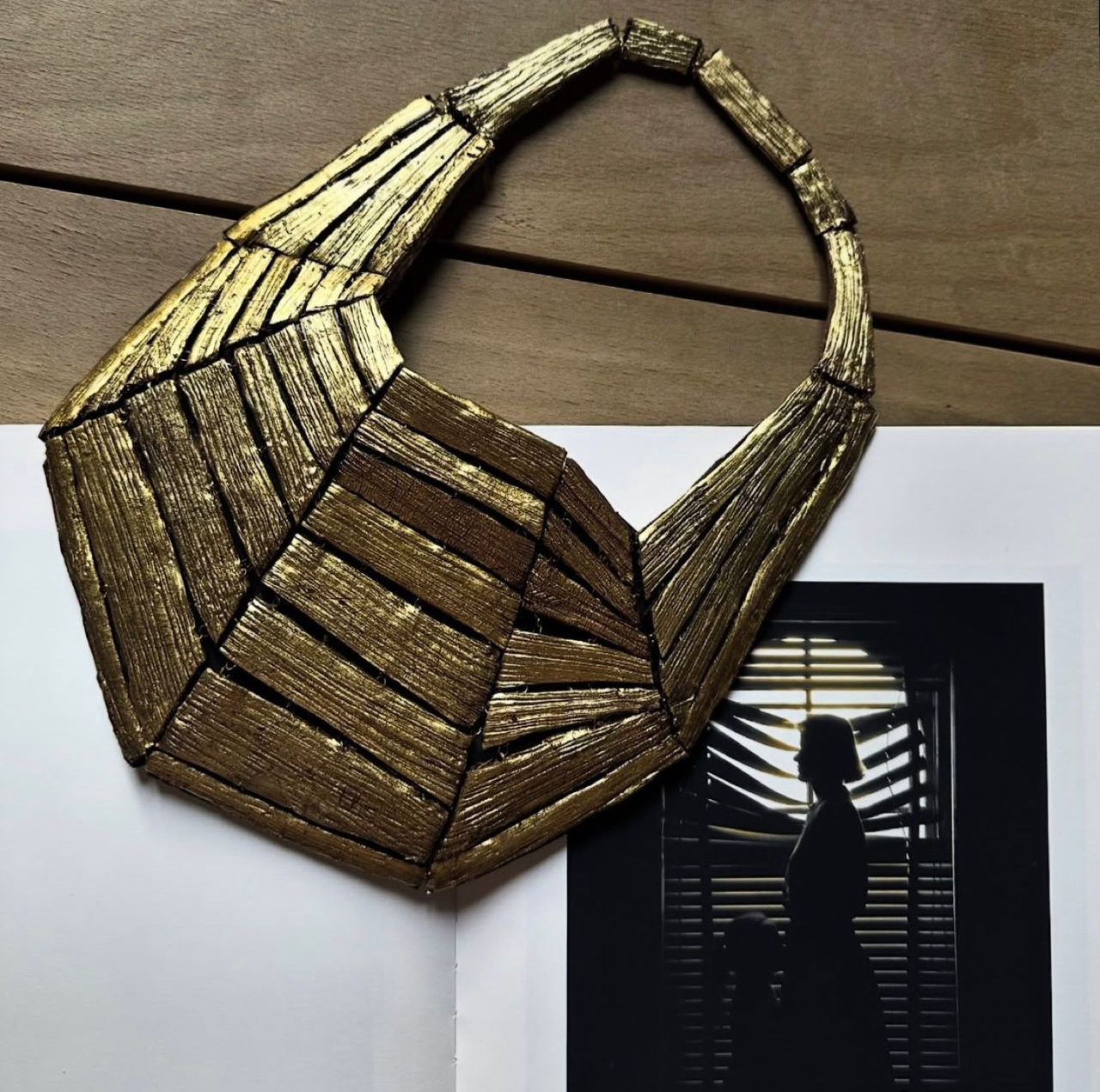 GFW clutches in gold, black, silver, red and checkerboard