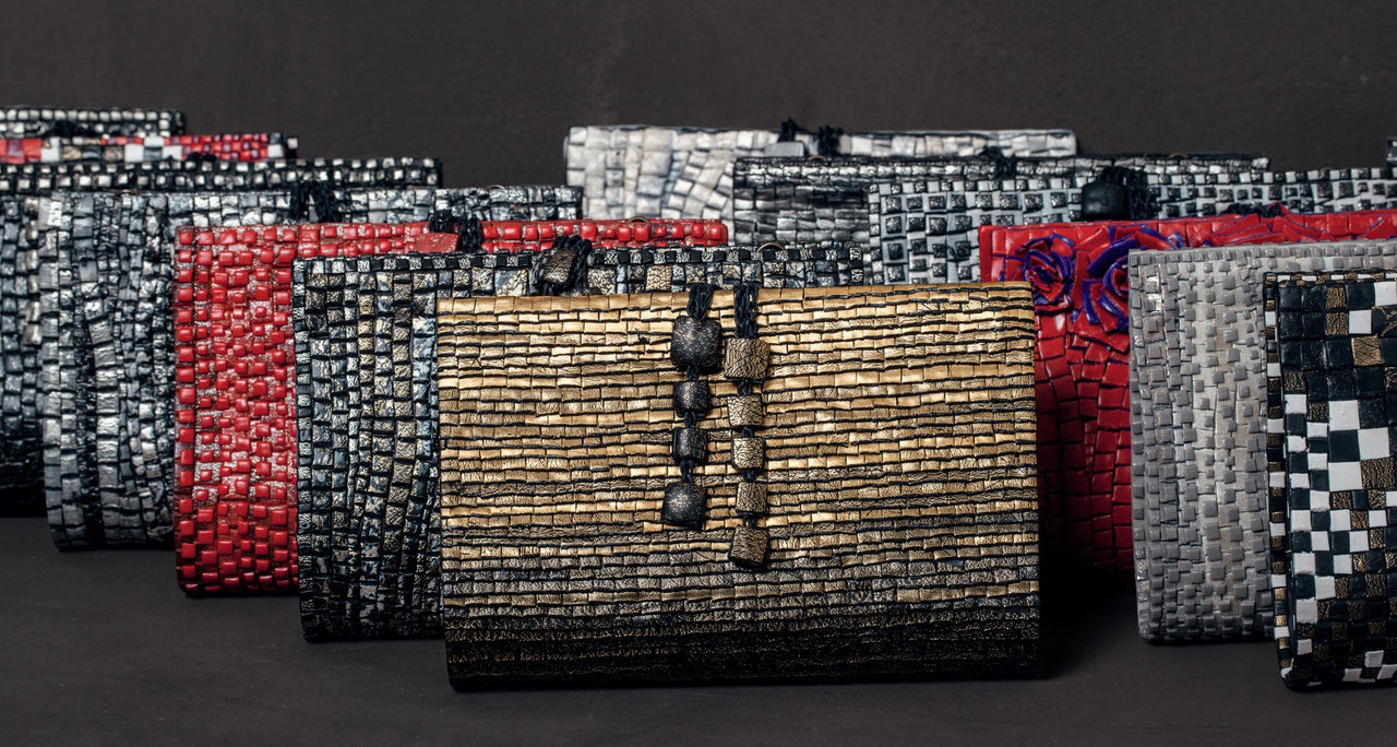 GFW clutches in gold, black, silver, red and checkerboard
