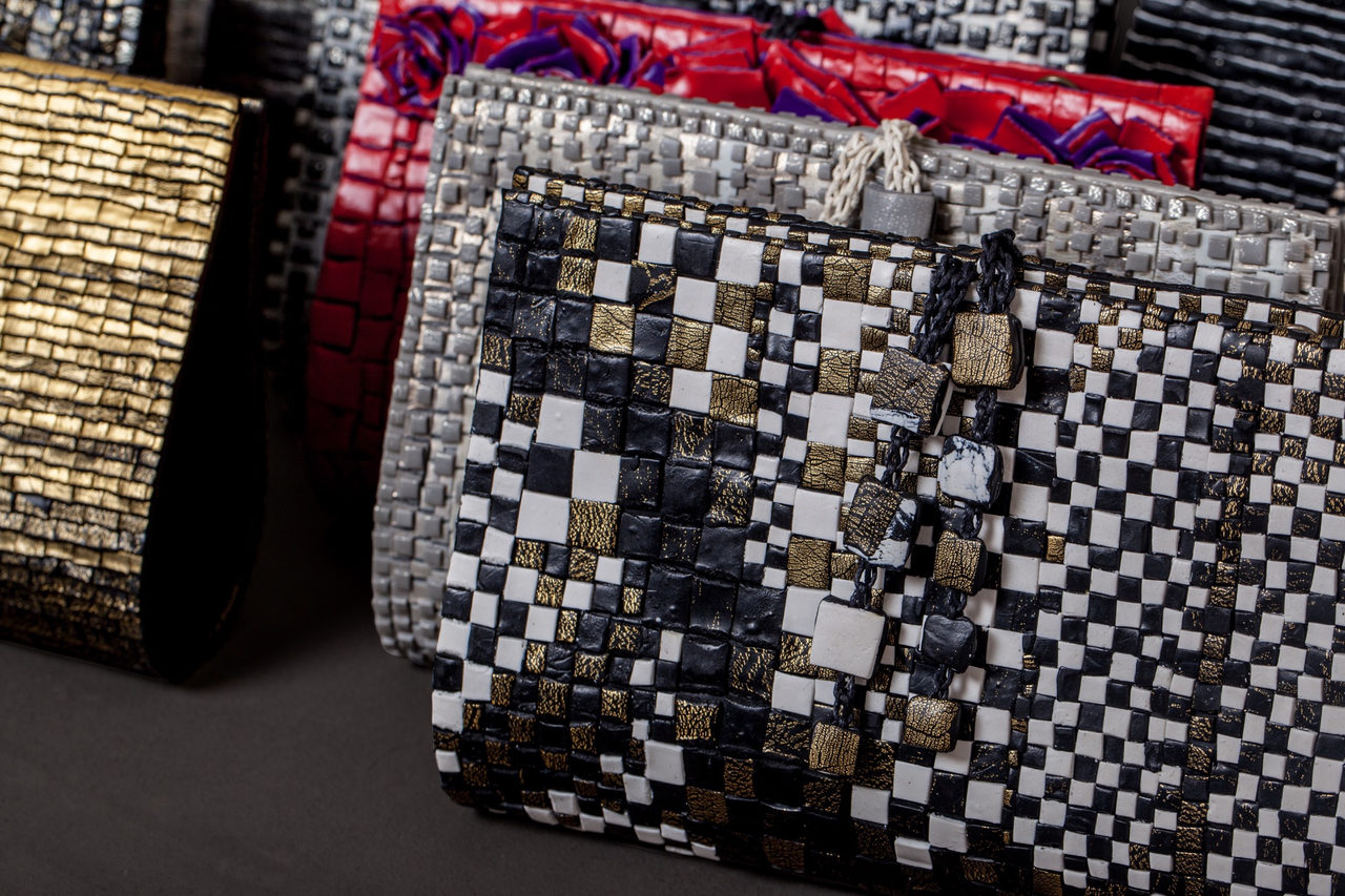 GFW clutches in gold, black, silver, red and checkerboard