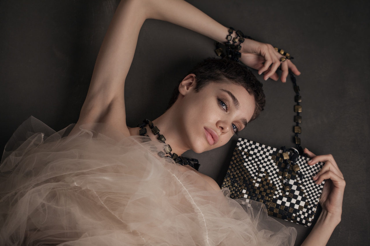 GFW clutches in gold, black, silver, red and checkerboard