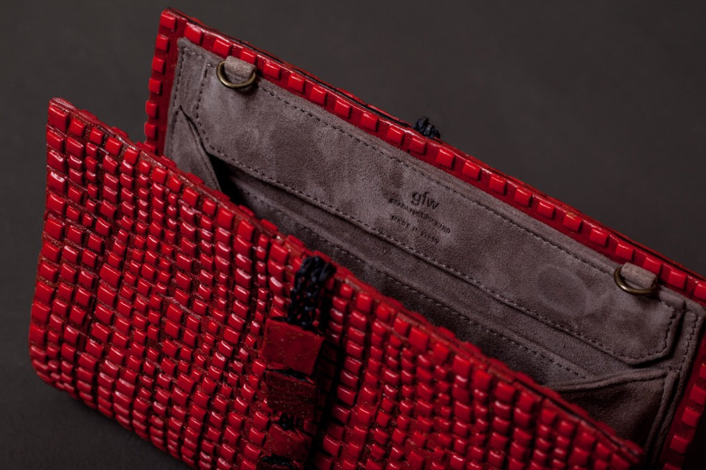 GFW clutches in gold, black, silver, red and checkerboard
