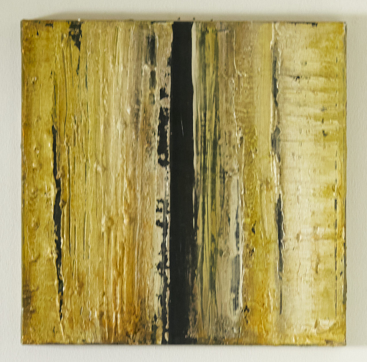 A painting by Grazia Fortuna Ward in yellow, ochre and black